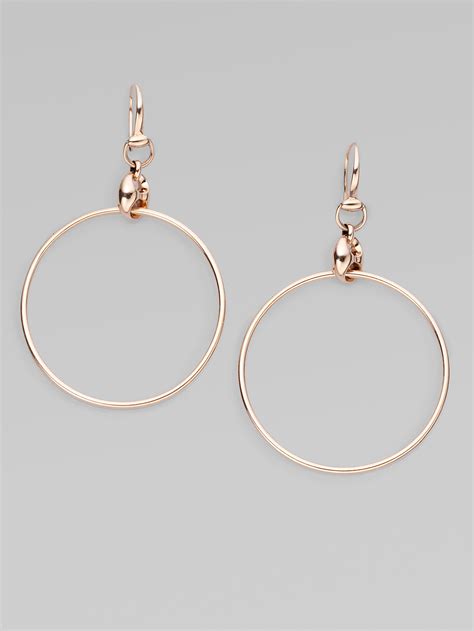 gucci pink gold earrings.